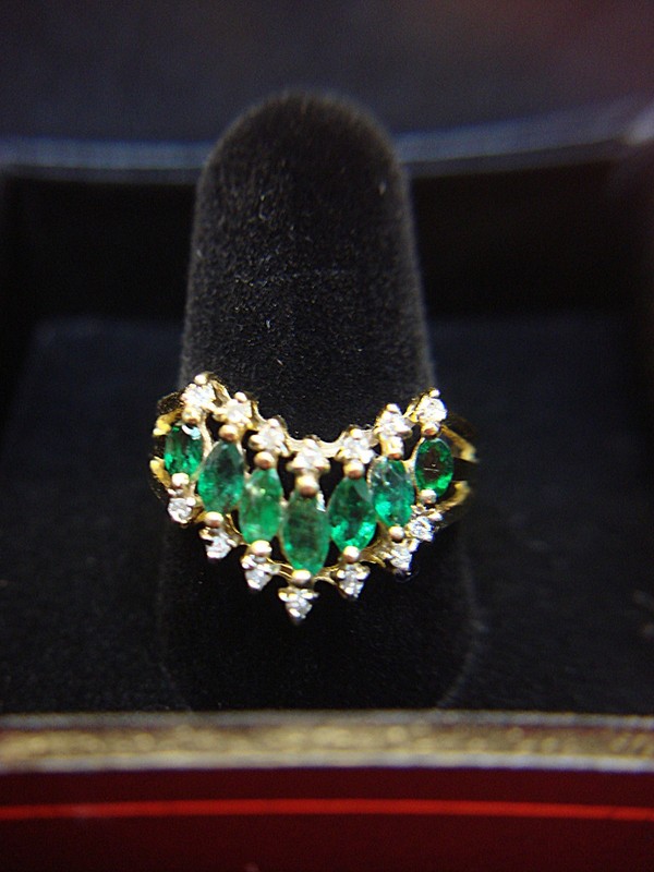 14K yellow gold ring with marquise-cut emeralds and round diamonds