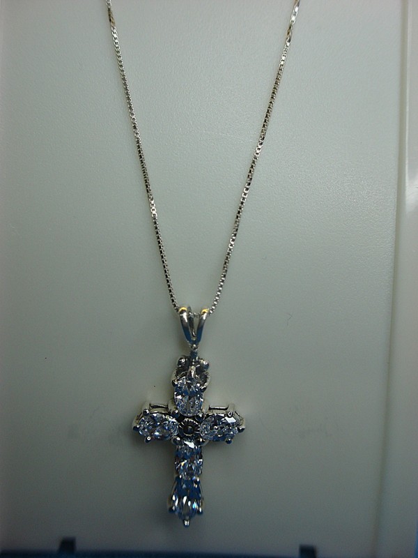 Sterling silver diamond simulant cross pendant necklace on an 18-inch chain