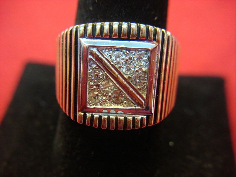 Men's gold-tone ring with black highlights and diamonds, size 10