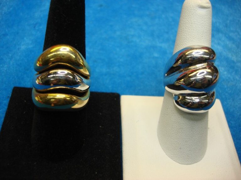 Gold and silver tone fashion ring set, sizes 7.5 and 9