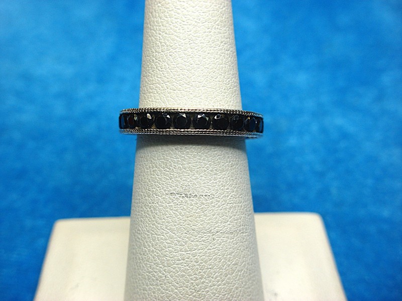 Elegant sterling silver ring with onyx-like glass stones, size 6
