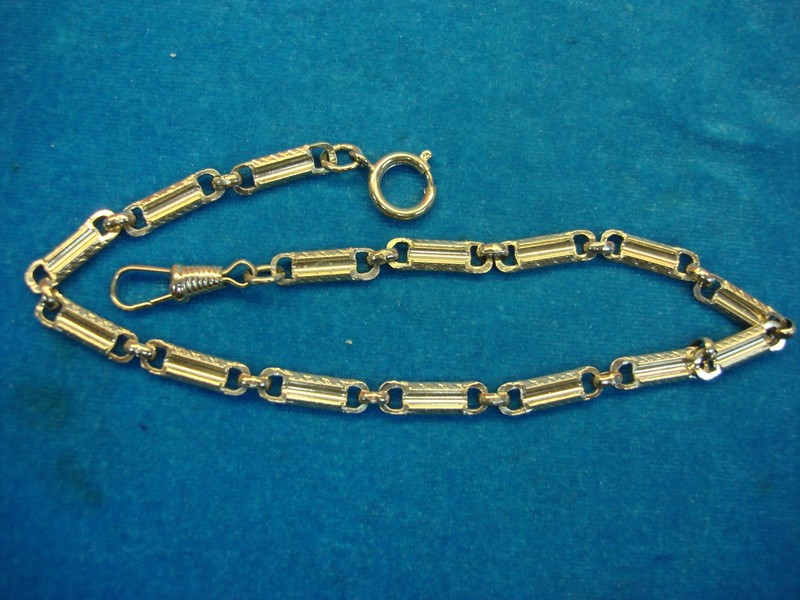 Vintage silver tone pocket watch chain with elegant fancy links, excellent condition