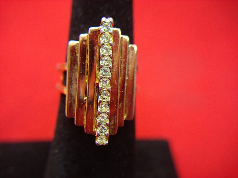 Gold tone cocktail ring with simulated diamonds