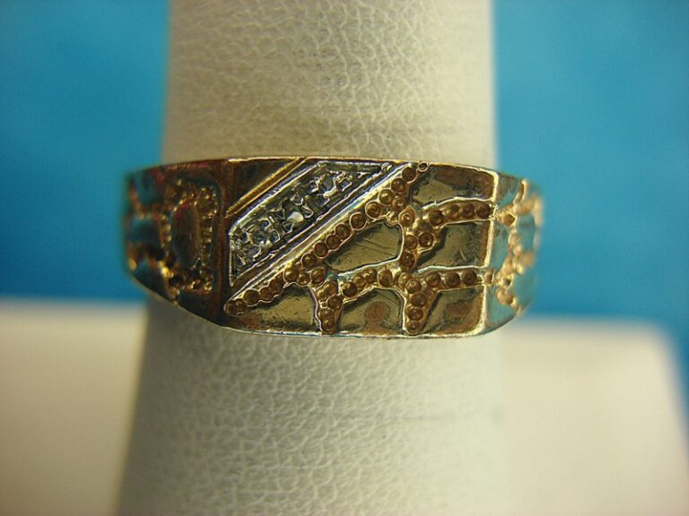 Avon gold tone ring with a genuine accent diamond, size 7 3/4, pre-owned