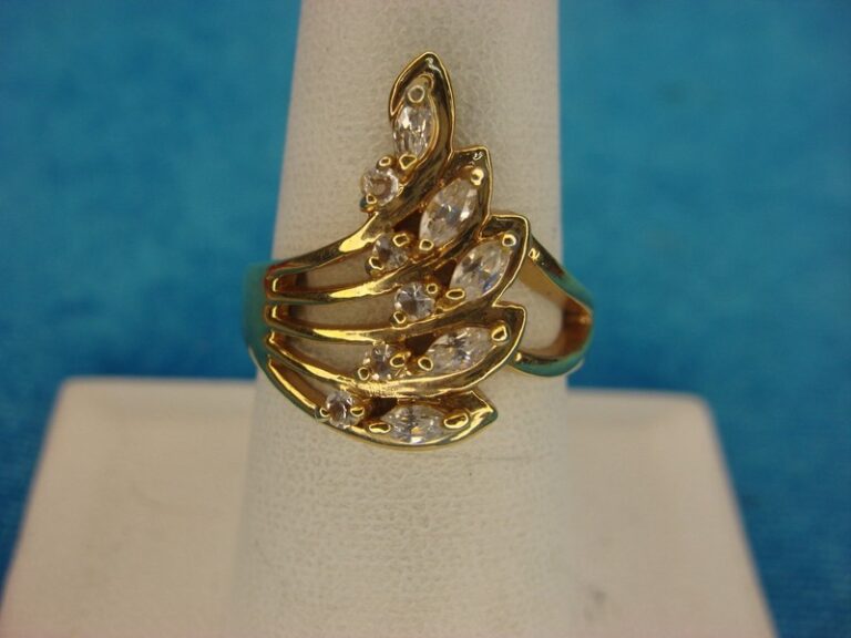 Elegant gold-tone cocktail ring with round and marquise simulated diamonds, size 7 3/4