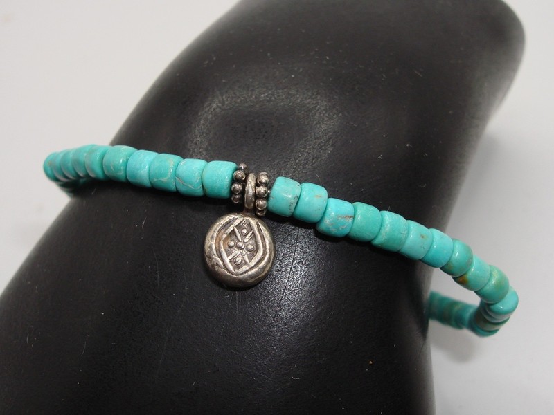 Sterling silver turquoise bead bracelet with charm