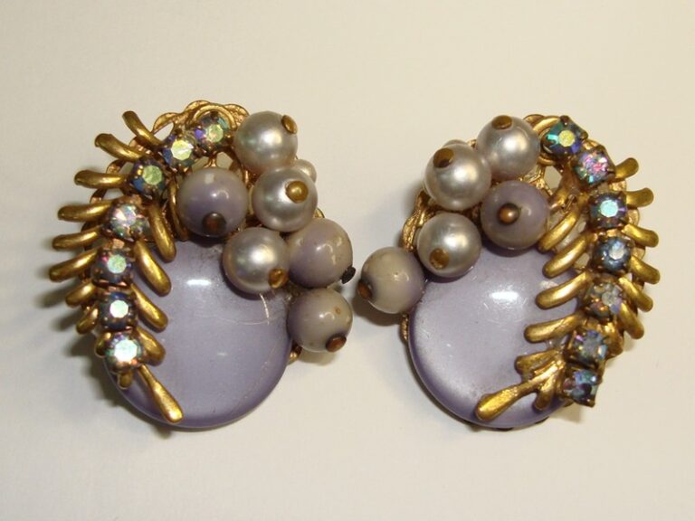 Vintage clip-on earrings with purple lucite, rhinestones, faux pearls and beads