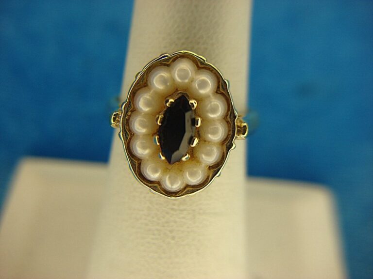 Vintage Avon gold-tone ring with a red stone and faux pearls, size 6 1/2