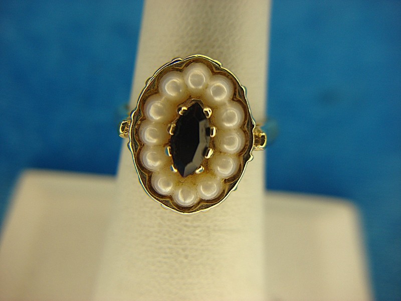 Vintage Avon gold-tone ring with a red stone and faux pearls, size 6 1/2