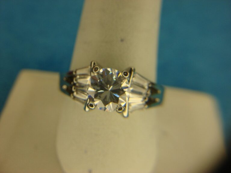 Sparkling faux diamond ring with baguette accents