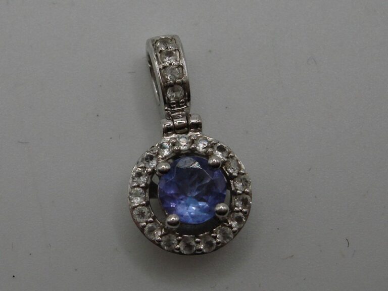 10K white gold diamond and tanzanite pendant