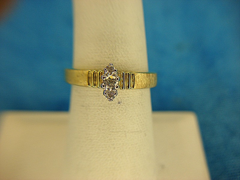 Sterling silver ring with gold vermeil and three brilliant diamonds, size 7
