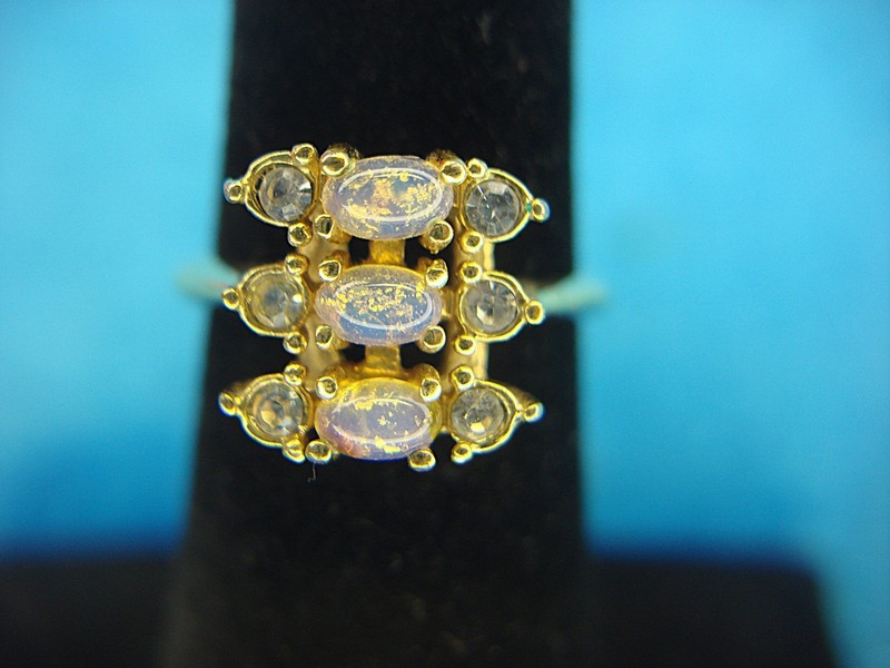 Avon gold tone ring with faux opals and rhinestones, size 5 1/2