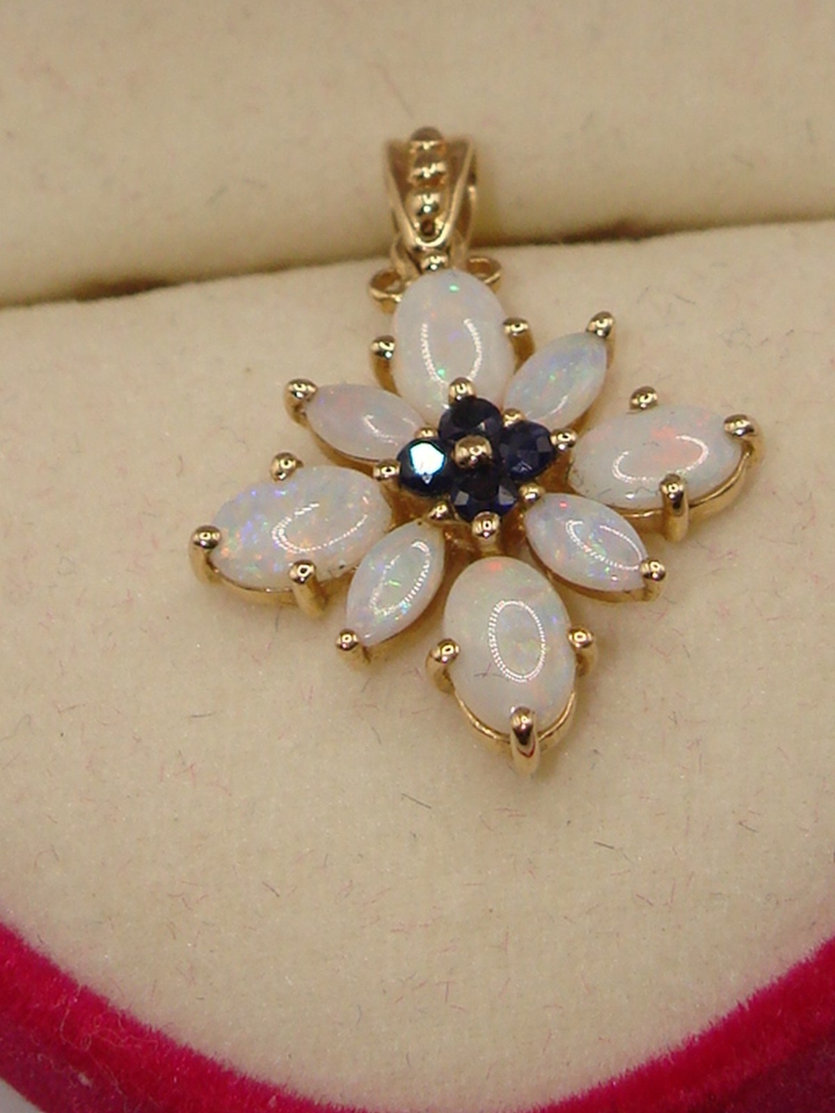 14K gold pendant with fiery opals and sapphires