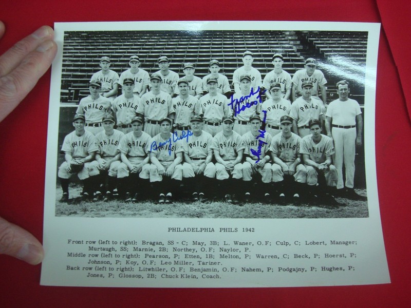 Vintage baseball memorabilia, an autographed 8x10 photo of the 1942 Philadelphia Phillies with three player signatures.