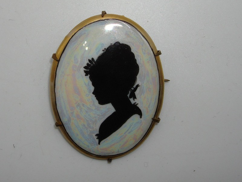 Vintage Victorian iridescent silhouette brooch with hand-painted lady design