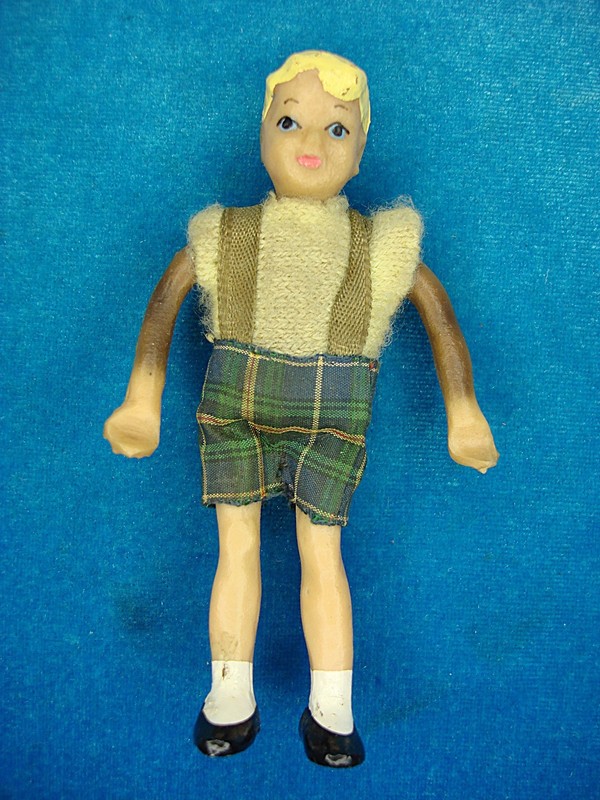 Antique German dollhouse boy figure, 4 inches tall, wearing shorts