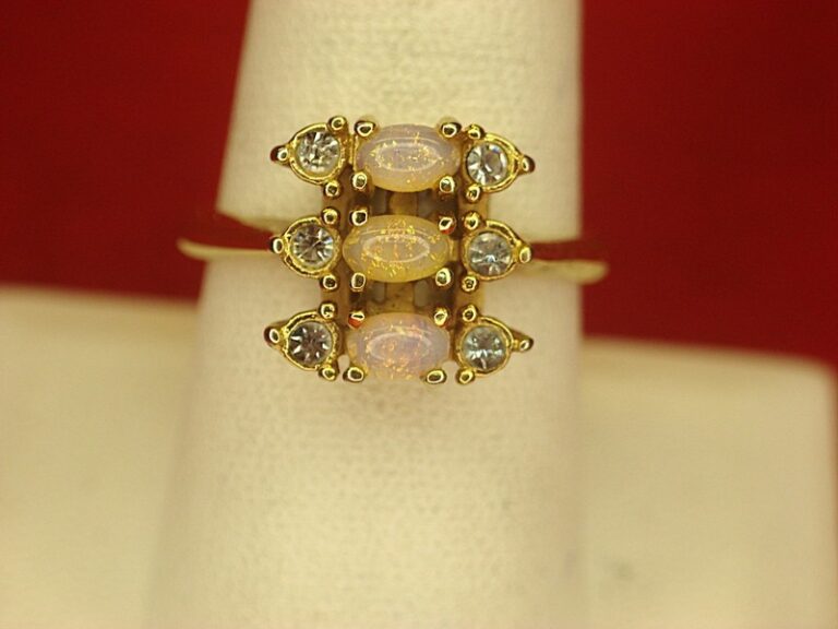 Vintage Avon gold tone ring with faux opals and brilliants, size 8 3/4