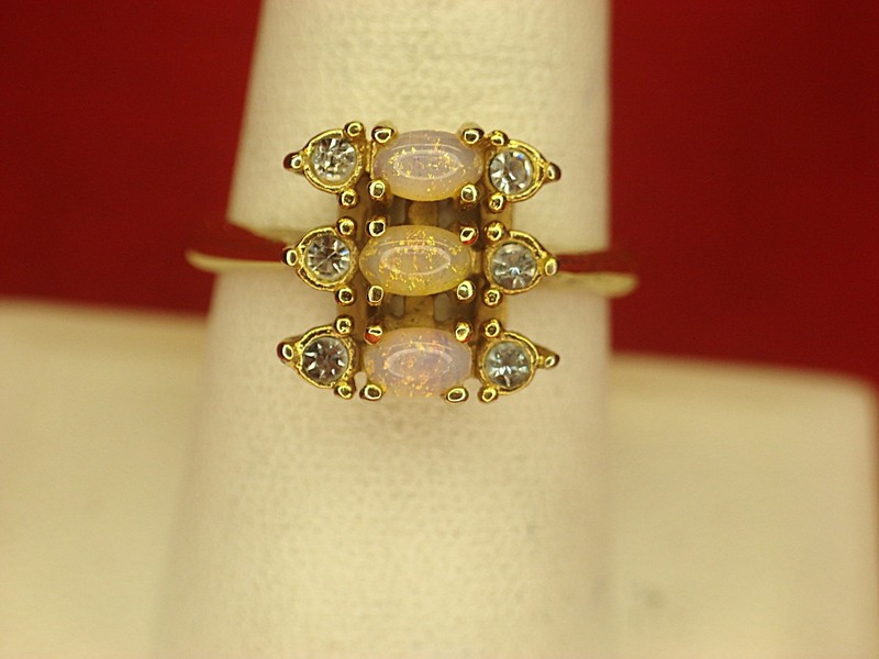 Vintage Avon gold tone ring with faux opals and brilliants, size 8 3/4