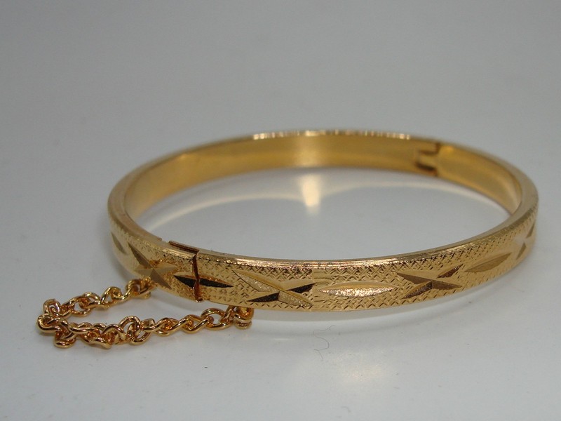 Vintage gold-tone hinged baby bangle bracelet, 1980s, mint condition
