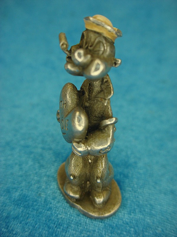 Vintage 1980 Spoonttique Popeye pewter figure holding a heart inscribed with 'WITH LOVE'