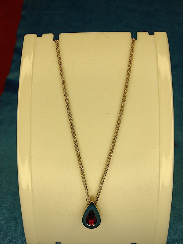 Vintage Avon gold-tone necklace with red teardrop stone, adjustable 15-19 inches