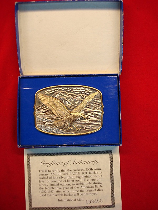 American Eagle silver and 24K gold plate belt buckle, new in box with certificate