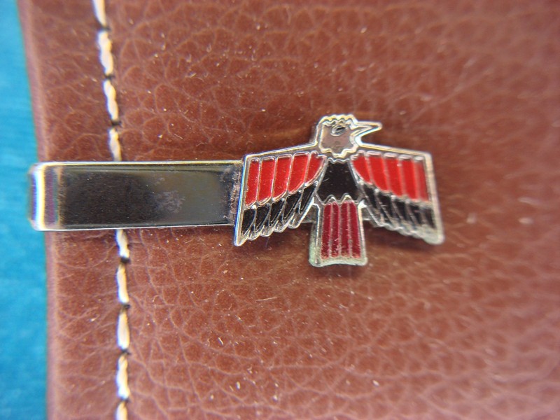 Vintage silver-tone tie clip with a 1967-69 Pontiac Firebird emblem