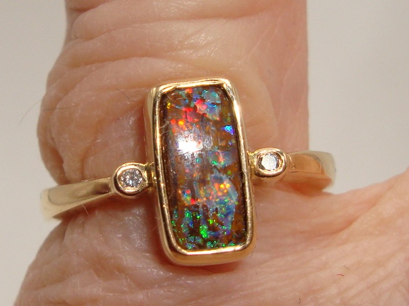Fiery Australian boulder opal and diamond ring in 14K gold (size 6)