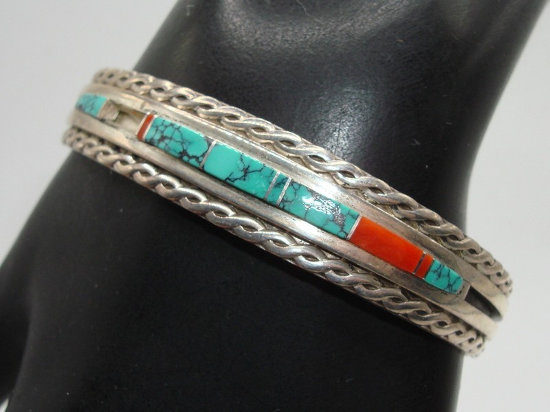 Vintage Native American sterling silver cuff bracelet with turquoise and coral inlay, signed WM