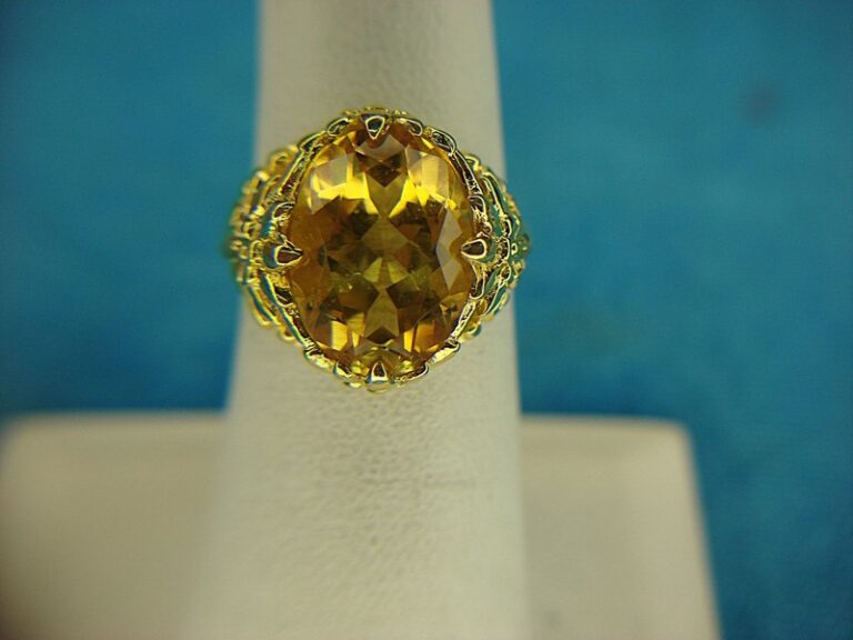 Elegant gold vermeil sterling silver ring with oval yellow gemstone, size 6