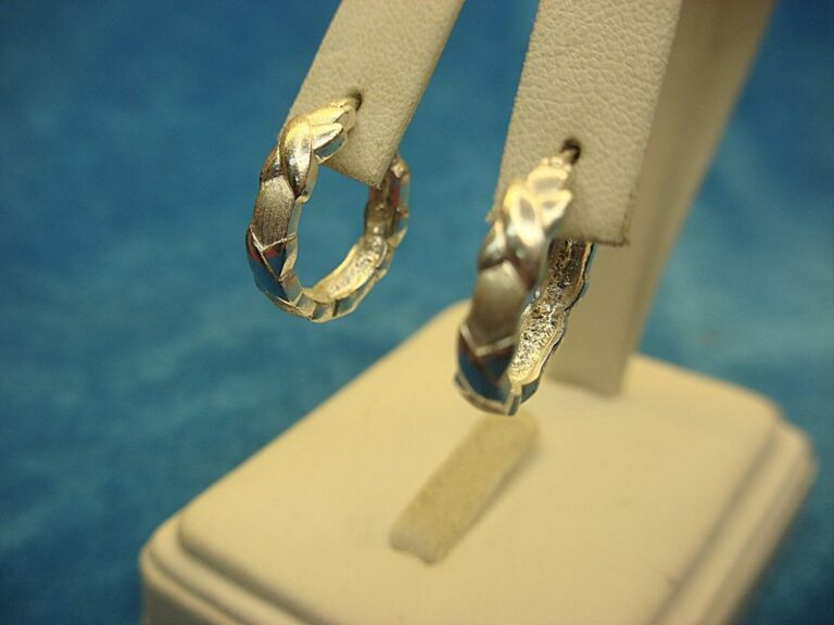 Sterling silver hoop earrings with a polished and matte pattern design