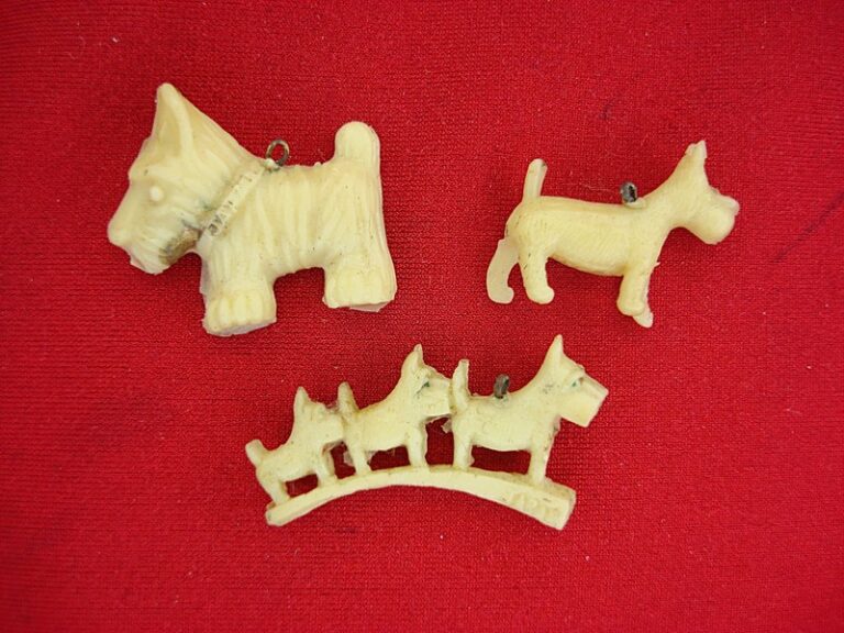 Vintage celluloid Scottie and Schnauzer Cracker Jack prizes from the 1940s