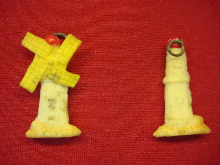 Vintage 1940s Cracker Jack prizes, celluloid lighthouse and windmill set