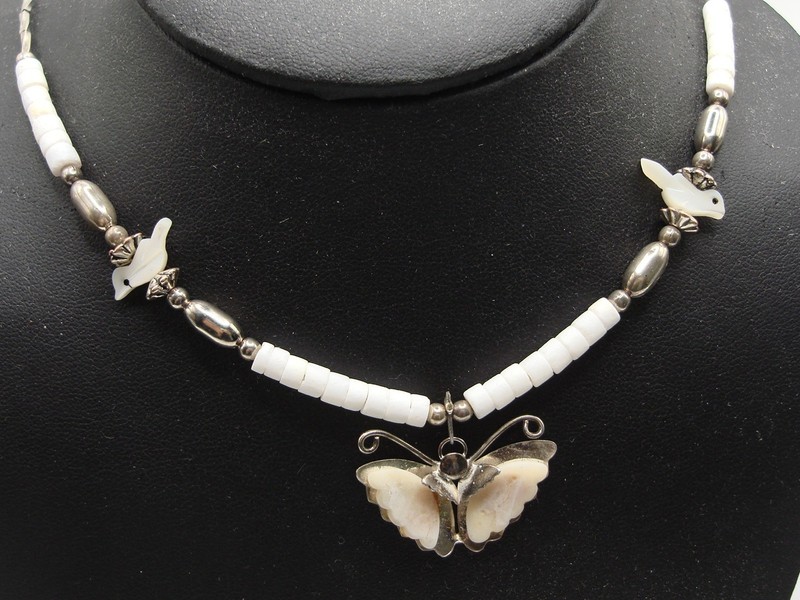 Vintage southwestern necklace with heishi beads and mother-of-pearl birds