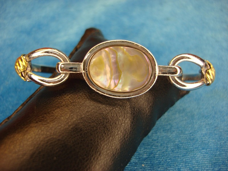 Vintage Avon hinged bangle bracelet with abalone inlay, silver & gold tone