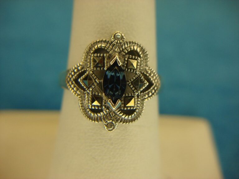 Sterling silver marquise ring with deep blue stone and marcasites, size 7 3/4