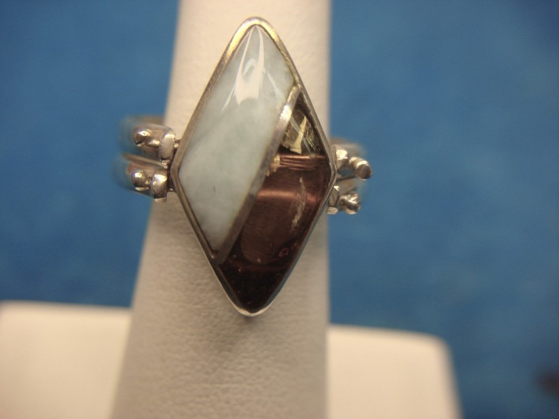 Sterling silver flip ring with onyx, larimar, and amber gemstones.