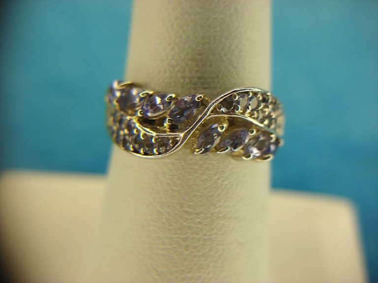 Sterling silver ring with purple and clear stones, size 7
