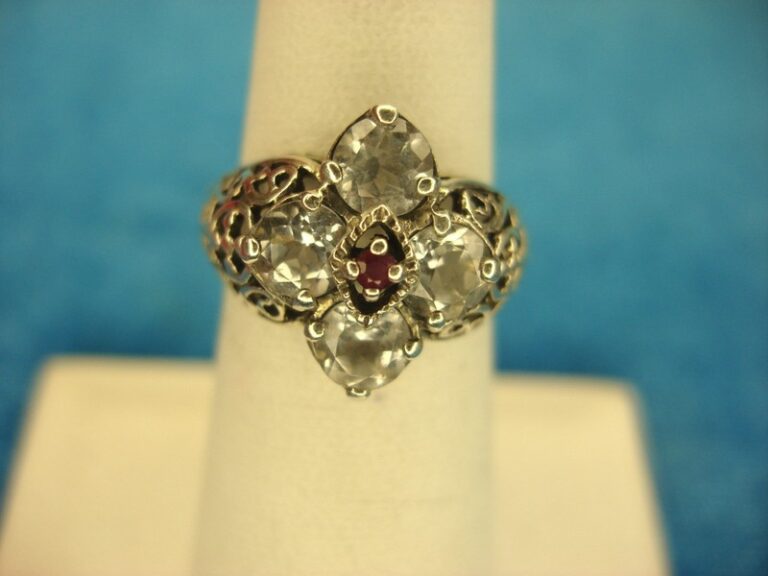 Sterling silver filigree ring with red stone and simulated diamonds, size 6