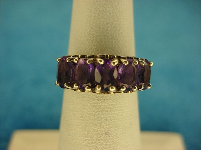 Sterling silver heart ring with purple stones, size 5 (pre-owned)