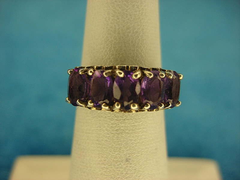 Sterling silver heart ring with purple stones, size 5 (pre-owned)