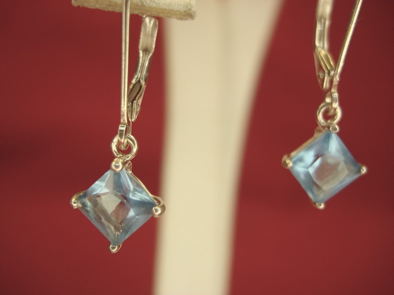 Vintage sterling silver dangle earrings with light blue gemstones