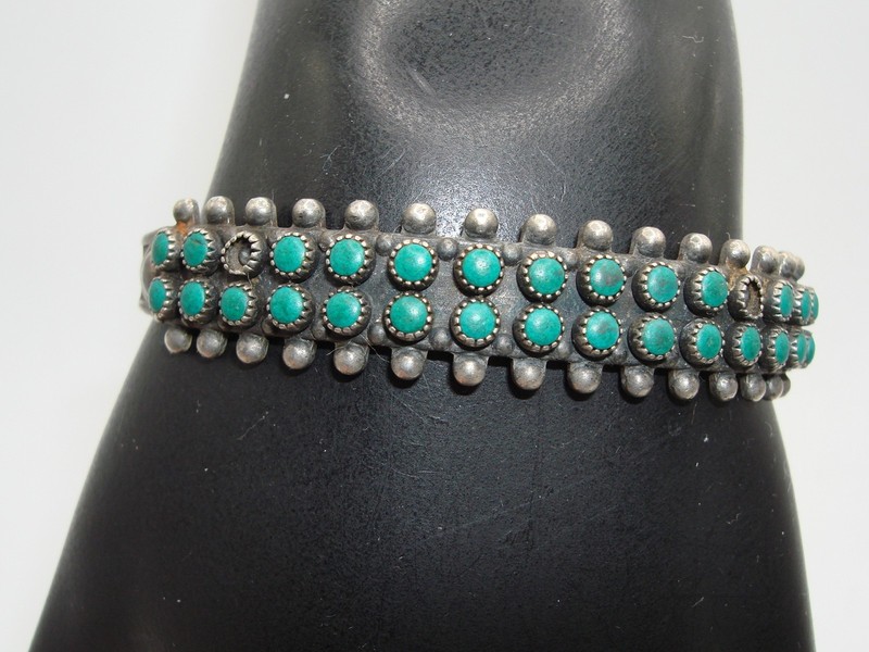 Vintage Zuni sterling silver cuff bracelet with turquoise accents, signed and authentic