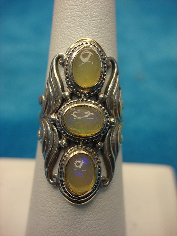 Sterling silver ring with three oval opals, size 6 3/4