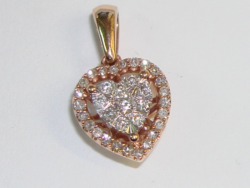 1/4 CTW Diamond Heart Pendant in 10K Rose Gold