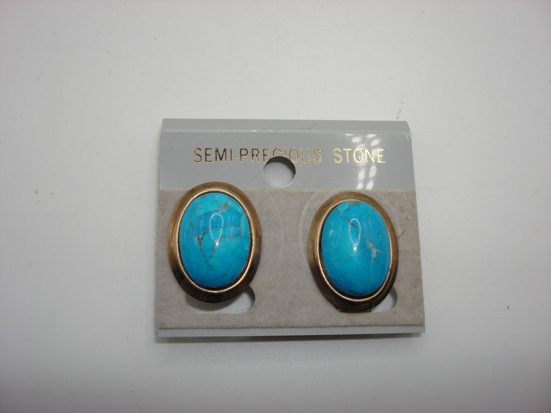 Vintage gold-tone clip-on earrings with turquoise cabochons