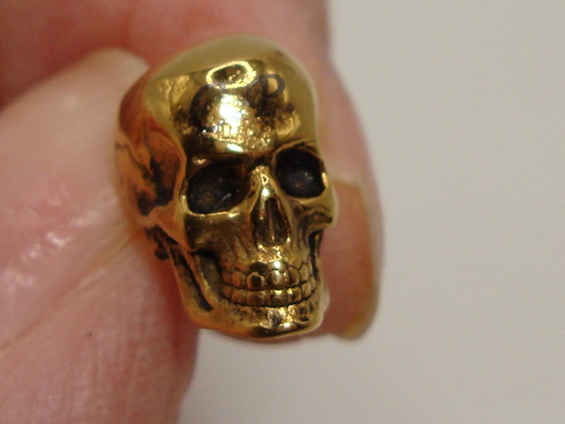 Vintage gold-tone skull biker earring