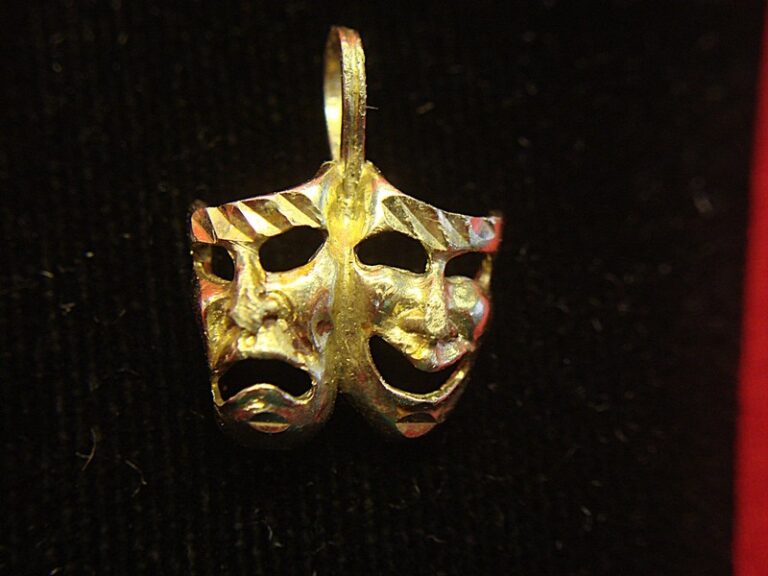 14K yellow gold thespian pendant with diamond cut accents