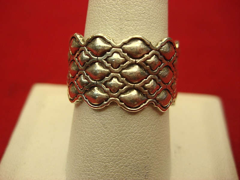 Sterling silver band ring with intricate pattern